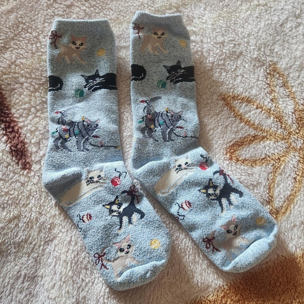 light blue christmas socks with cats